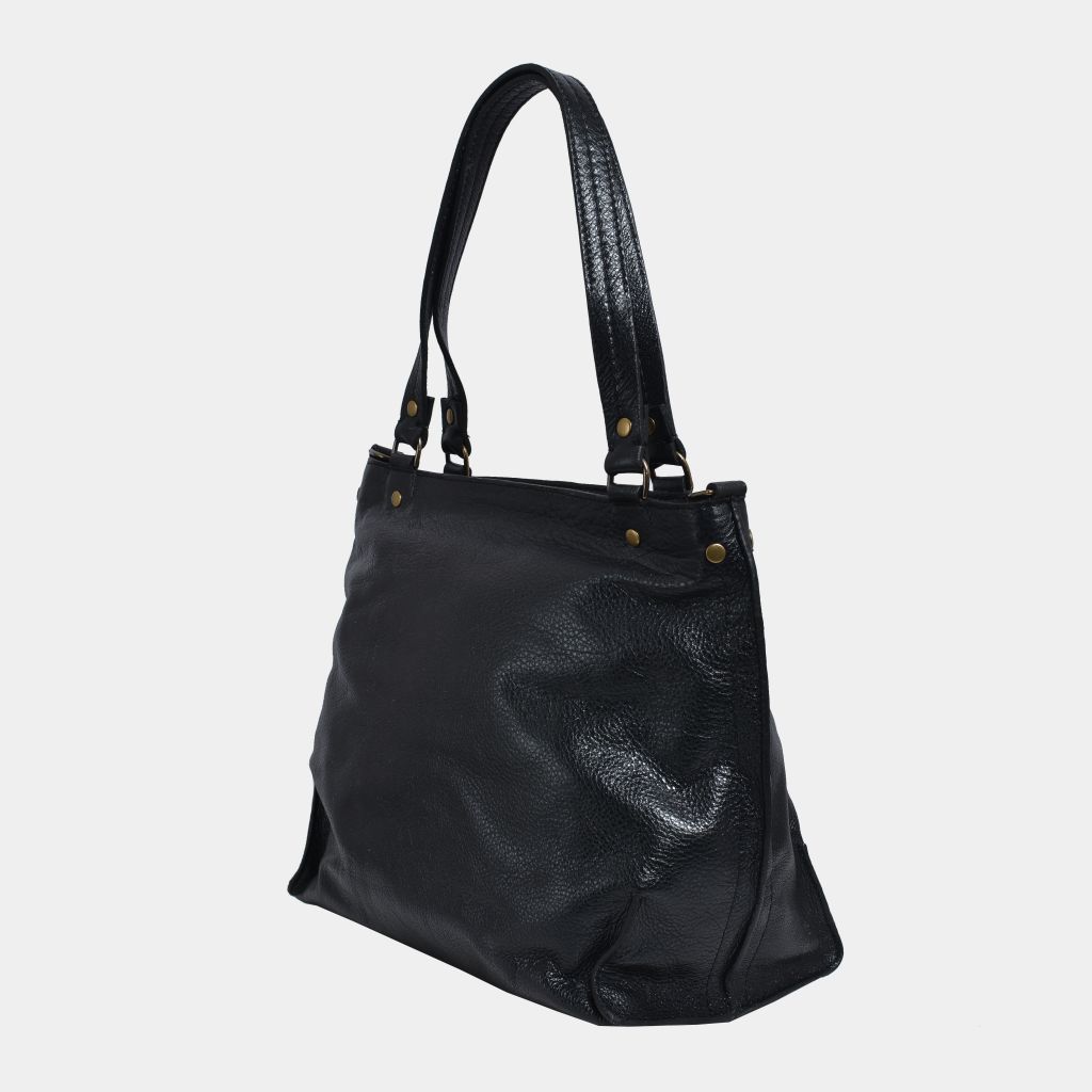 Onyx black butter leather bag on a light gray background