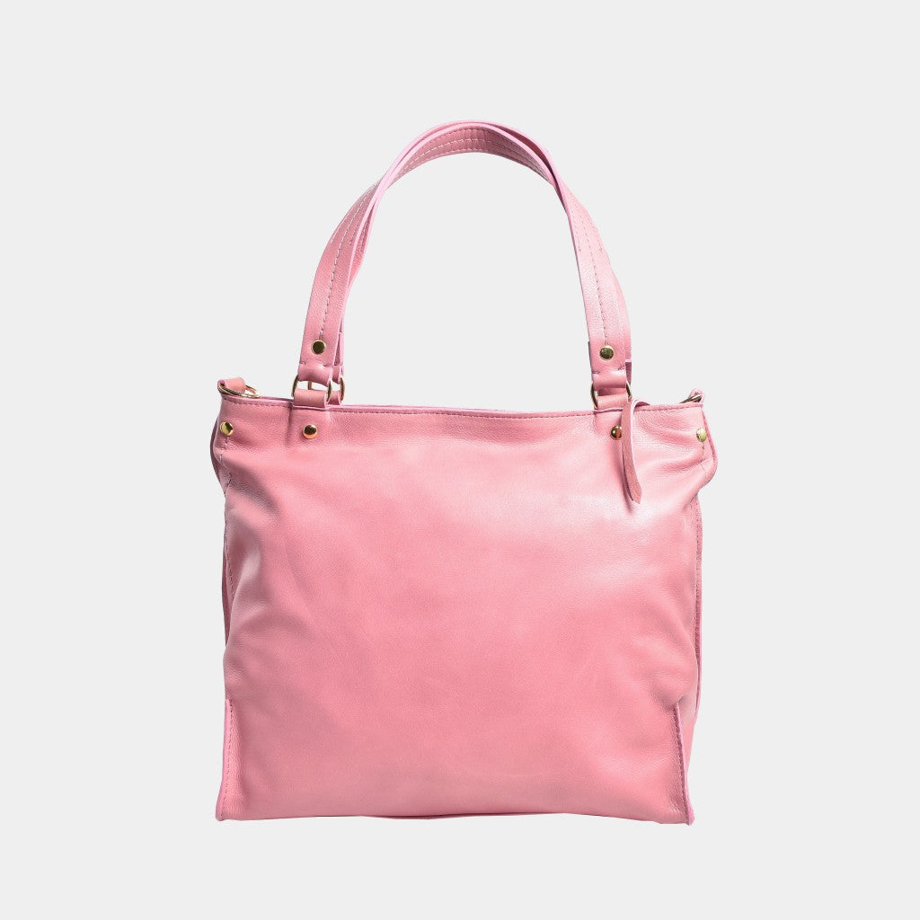 Rose Quartz Butter Leather bag on a light gray background