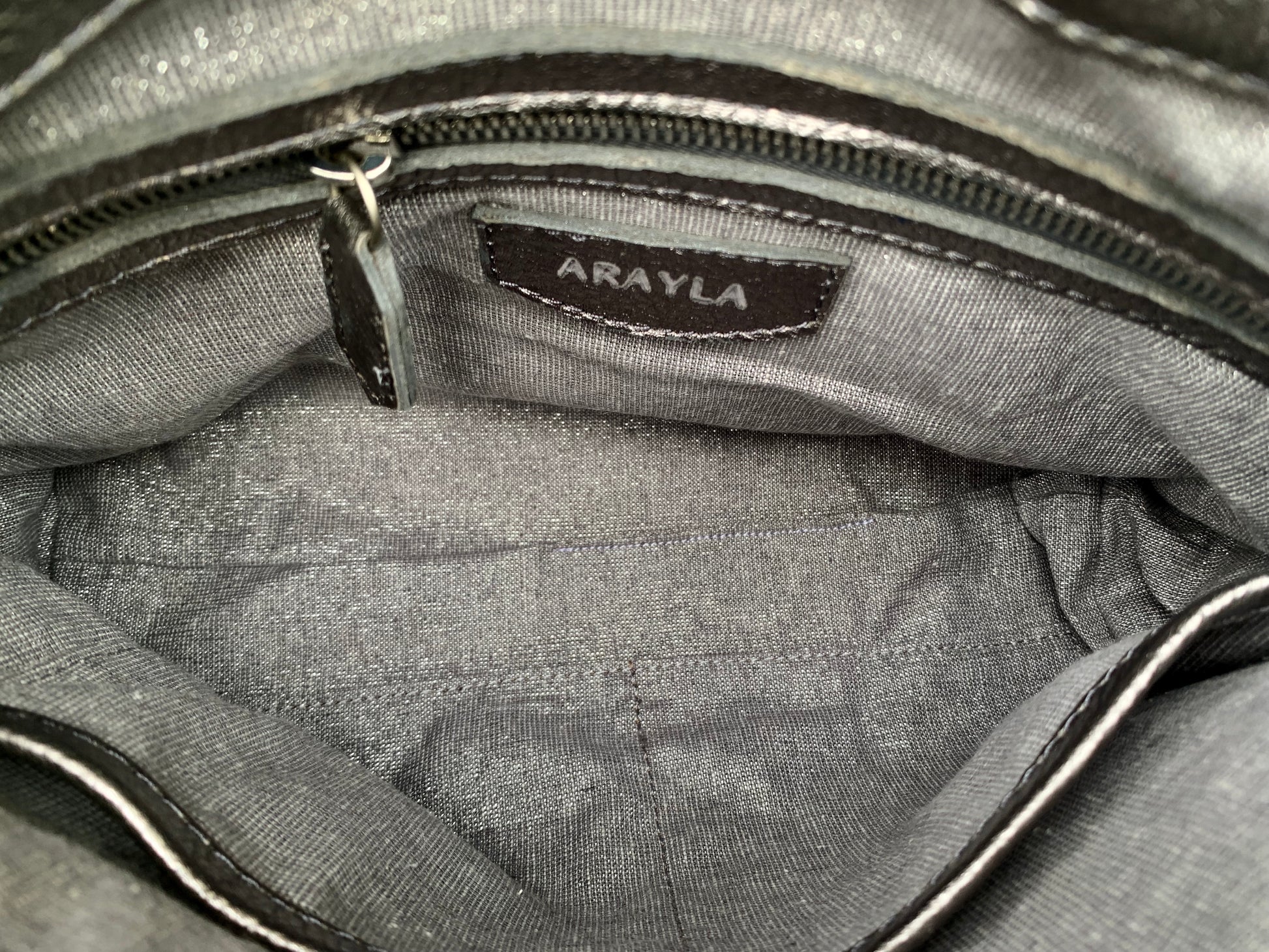 Pewter Metallic bag interior with 'ARAYLA' brand label, zip pocket and two slip mobile pockets.
