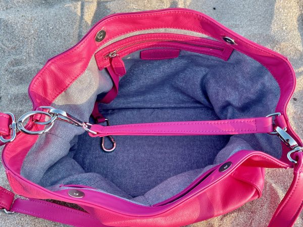 Hibiscus pink bag inside view with grey lining and an inside zipped pocket.