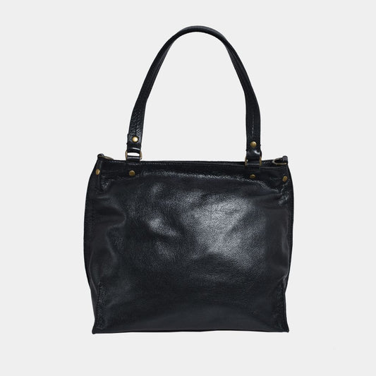 Onyx Black Metallic leather tote bag front view on a light gray background