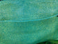 Close-up of the mermaid green stingray embossed Leather